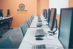 Computer literacy course at Wheelset Academy with desktop computers for computer skills short course