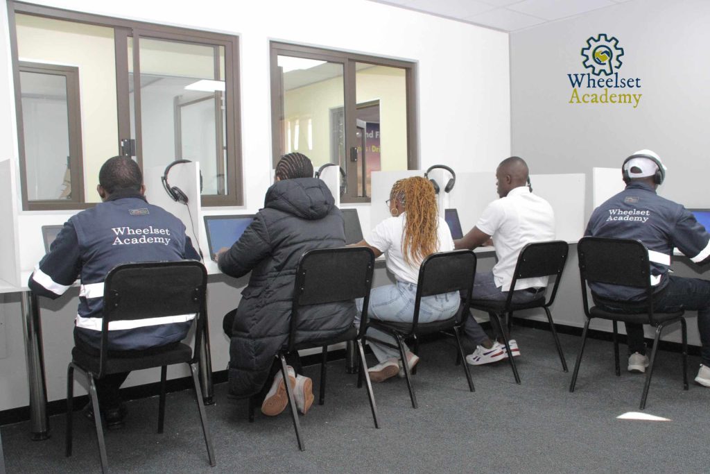 Full classroom of learners attending computer short courses and computer literacy course at Wheelset Academy