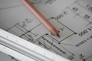 Quantity Surveying Viability Planner course learner reviewing cost estimates and a viability report at Wheelset Academy