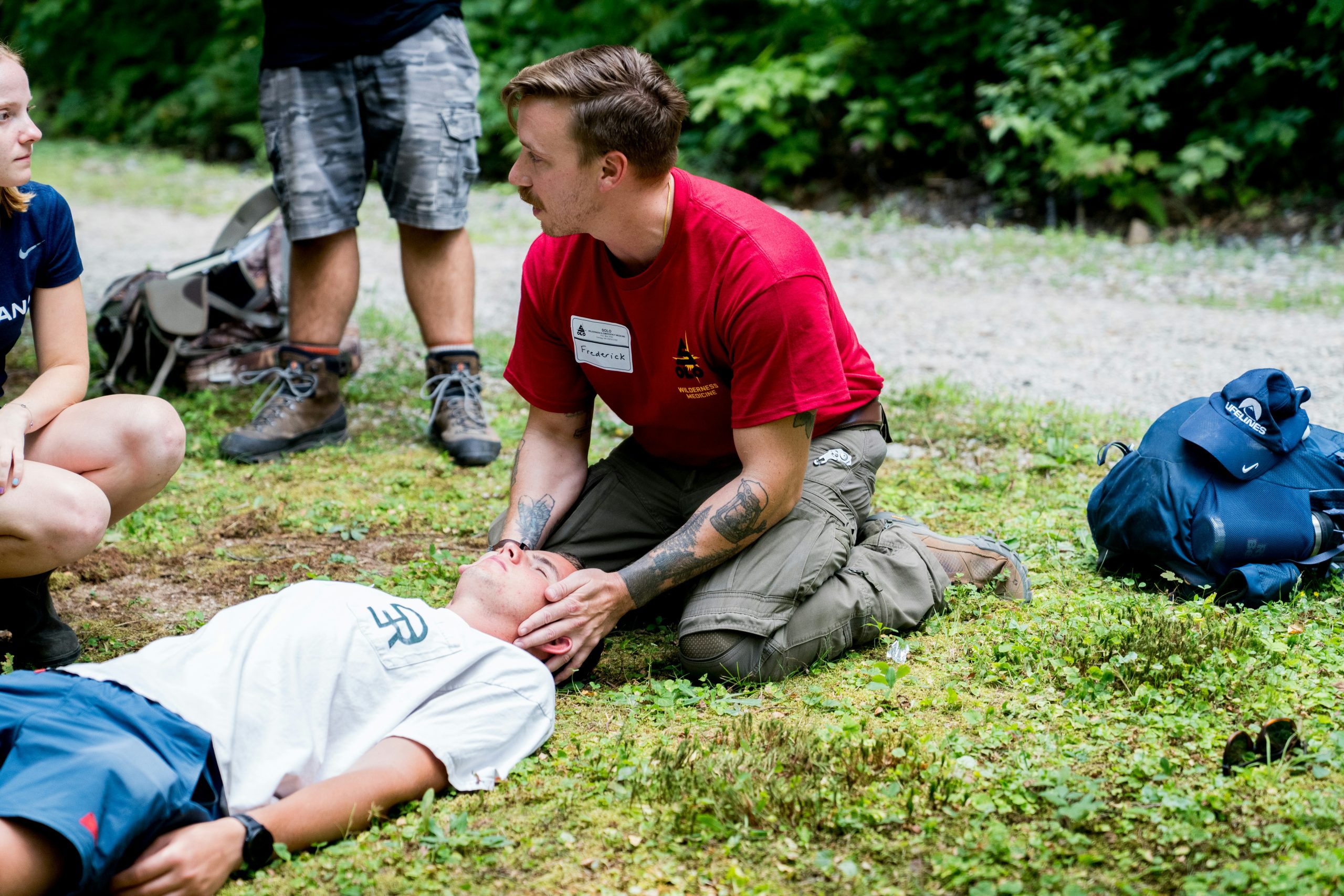 Advanced emergency first aid responder learner assessing a simulated casualty with a bag valve mask at Wheelset Academy
